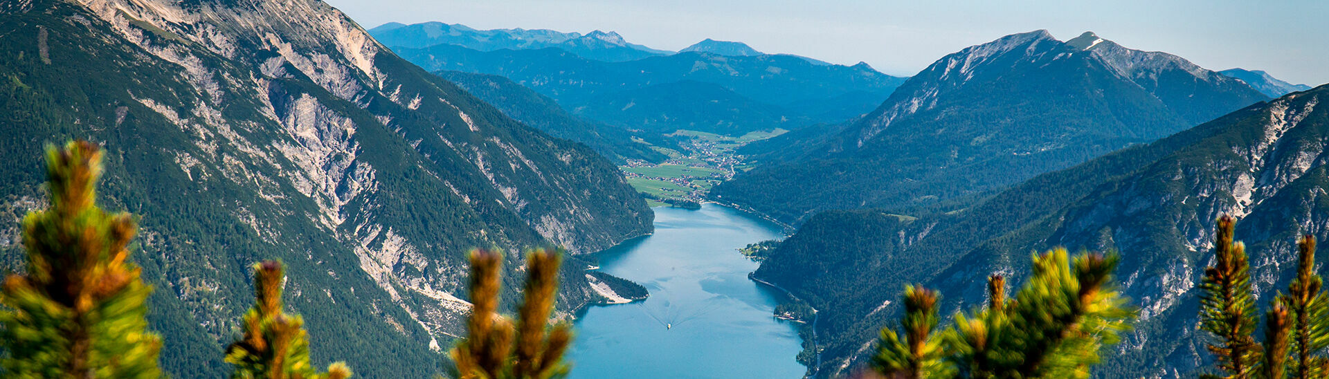 The region offers many hiking tours with gorgeous views of Lake Achensee and its surrounding villages.}
