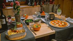 richly laid table with a variety of dishes in the Ziho Genussreich